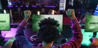 back of man winning video game tournament
